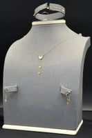 طقم فراشة ذهب صافي عيار 21 وزن من 1.4 الى 1.5 جرام