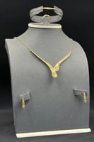 طقم ورقة الشجر ذهب صافي عيار 21 وزن 8 جرام