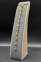 عقد مع اسوارة جنزير ذهب تصميم الماس عيار 21 وزن 27...