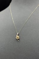 عقد ثعبان ذهب صافي لونين عيار 18 وزن 1 جرام