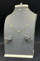 طقم ذهب زهرة ذهب صافي عيار 18 وزن من 1.3 الى 1.4 ج...