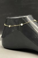 خلخال دائري ذهب مع صدف ابيض عيار 18 وزن 1.8 جرام