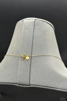 عقد كور نازل مع شكل اسطواني ذهب صافي عيار 21 وزن 1...