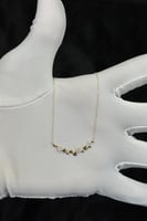 عقد دوائر ذهب تصميم الماس عيار 18 وزن 0.9 جرام