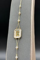 اسوارة شناف ذهب مع لؤلؤ عيار 18 وزن 2.2 جرام