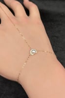 كف نص دائره ذهب مع لؤلؤ عيار 18 وزن من 1.5 الى 1.6...