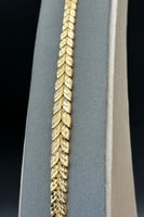 اسوارة أوراق الشجر ذهب صافي عيار 21 وزن 11.1 جرام