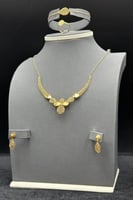 طقم ذهب صافي عيار 21 وزن 8.3 جرام