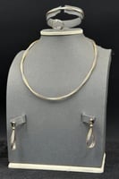 طقم قماش ذهب صافي ايطالي عيار 18 وزن من 5.3 الى 5....