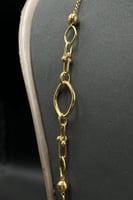 عقد كور مع حلقات ذهب صافي عيار 21