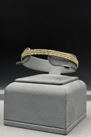 اسوارة مع خاتم ذهب صافي عيار 18 وزن من 6.64 الى 6....