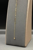 اسوارة ذهب عيار 18 صافي بتصميم كور ملونة بوزن 0.8...