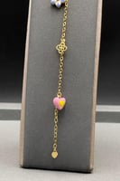 عقد مع اسوارة زهرة و قلب ذهب ملون عيار 18