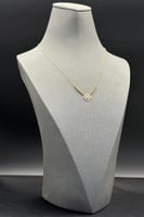 عقد وردة ذهب صافي عيار 18 وزن 1.1 جرام