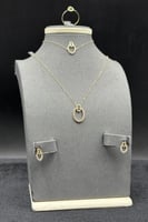 طقم ذهب ناعم عيار 18 حلقة الرقي وزن من 2.5 إلى 2.6...