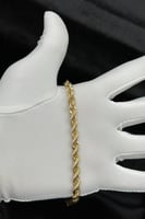 اسوارة مجدول ذهب صافي عيار 18 وزن 6.7 جرام