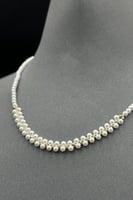 عقد لؤلؤ مع ذهب بالمنتصف عيار 18 وزن 1.1 جرام