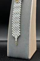 اسوارة لؤلؤ مع ذهب شكل وردة عيار 18 وزن 1.8 جرام