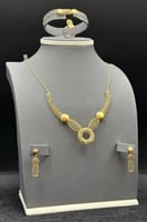 طقم ذهب صافي عيار 21 وزن 11.4 جرام