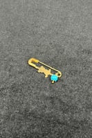 بروش اطفال دب ذهب مع صدف فيروزي عيار 21 وزن 0.7 جر...