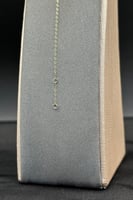 عقد مثلث مع اسوارة ذهب مع صدف ابيض عيار 18 وزن 0.8...