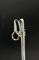 حلق مبروم ذهب صافي عيار 18 وزن 1.2 جرام