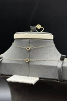 طقم دورين ذهب عيار 18 تناغم الدائرتين وزن 3.4 جرام