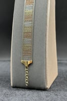 إسوارة سلم ذهب صافي ملون عيار 18 فخامة ألين وزن 9....