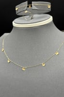 طقم فراشة ذهب صافي عيار 21 وزن 1.4 جرام