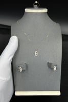 طقم اطفال مستطيل ذهب تصميم الماس عيار 18 وزن 1.2 ج...