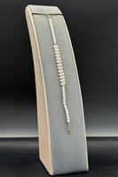 اسوارة لؤلؤ مع ذهب بالمنتصف عيار 18 وزن 1 جرام