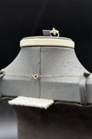 طقم اطفال زهرة ذهب تصميم الماس عيار 18 وزن من 2.1...