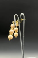 حلق لؤلؤ مع ذهب حلقات عيار 18 وزن 1.8 جرام