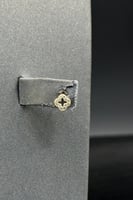 طقم اطفال وردة مفرغ ذهب تصميم الماس عيار 18 وزن 1....