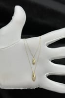 عقد دورين ذهب تصميم الماس عيار 18 وزن من 1.5 الى 1...