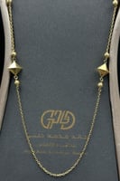 شال على شكل هرم ذهب صافي عيار 18 وزن 10.9 جرام