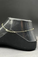 خلخال دائري ذهب مع صدف ابيض عيار 18 وزن 0.9 جرام