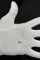 عقد اكس ذهب تصميم الماس عيار 18 وزن 0.5 جرام