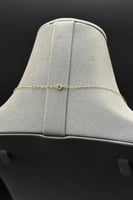 شال وردة ذهب تصميم الماس عيار 18 وزن 3.5 الى 3.6 ج...