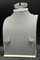 طقم فراشة ذهب صافي عيار 21 وزن 1.4 جرام