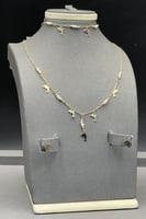 طقم اطفال دلفين ذهب مع لؤلؤ عيار 18 وزن 5 جرام