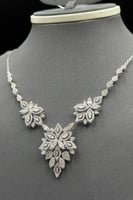 طقم ذهب أبيض للعروس عيار 18 إشراقة العهد وزن 19.2...