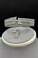 طقم كور نازل ذهب صافي عيار 21 وزن من 3.2 الى 3.3 ج...