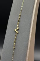 اسوارة V ذهب صافي عيار 18 وزن 0.8 جرام