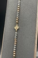 اسوارة ذهب عيار 18 وردات مع كور ذهب ملونه وزن 1.3...