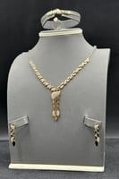 طقم ذهب للعروس عيار 18 سموّ الضفيرة وزن 12.3 جرام