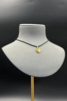 تعليقة عل شكل سبيكة بيضاوي ذهب ملون عيار 21 وزن 1....