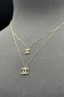 عقد شكل C دورين ذهب تصميم الماس عيار 18 وزن من 0.7...