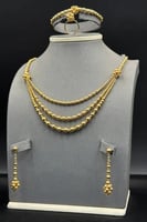 طقم كور ثلاث اشواط ذهب صافي عيار 21 وزن 19.8 جرام