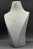 عقد وردتين لون فيروزي ذهب تصميم الماس عيار 18 وزن...